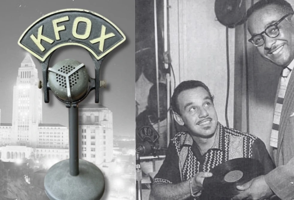 A collection of vintage microphones with radio station call letter flags.